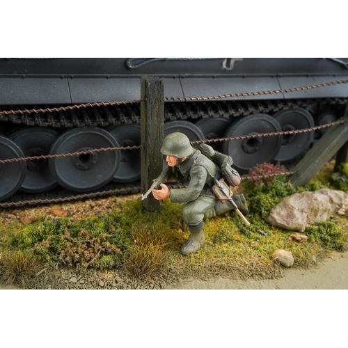 409 - A 21st century scale model World War II diorama of German troops with panzer tank by a barn with tro... 