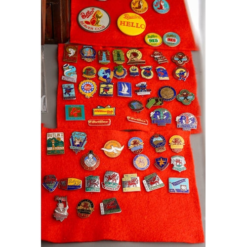 411 - A collection of over 215 enamel Butlins pin badges, mostly from the 1950's and 1960's with some late... 