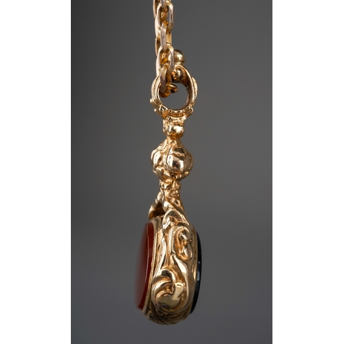 531 - A Victorian style 9ct gold swivel fob on a modern 9ct gold chain, the fob with foliate cast mount, t... 