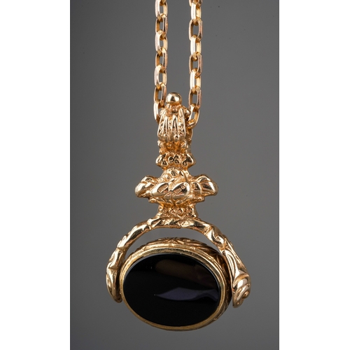 531 - A Victorian style 9ct gold swivel fob on a modern 9ct gold chain, the fob with foliate cast mount, t... 