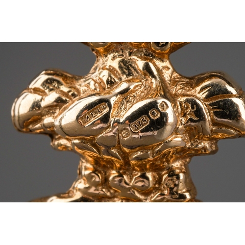 531 - A Victorian style 9ct gold swivel fob on a modern 9ct gold chain, the fob with foliate cast mount, t... 