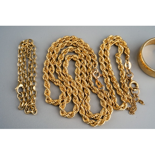 533 - Two 9ct gold band rings, a 9ct gold buckle ring, a 9ct gold rope twist necklace and matching bracele... 