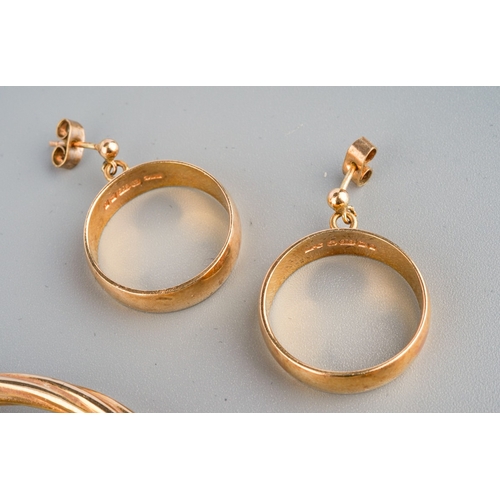 534 - Three pairs of 9ct gold hoop earrings, the largest pair of hollow rope twist design, diameter 55mm, ... 