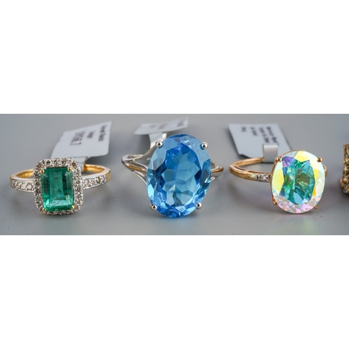 539 - Five modern 9ct gold dress rings, three with labels attached, including 'Mercury Mystic Topaz and Di... 