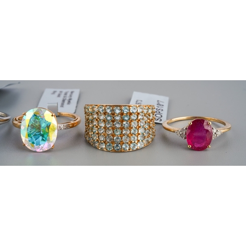 539 - Five modern 9ct gold dress rings, three with labels attached, including 'Mercury Mystic Topaz and Di... 