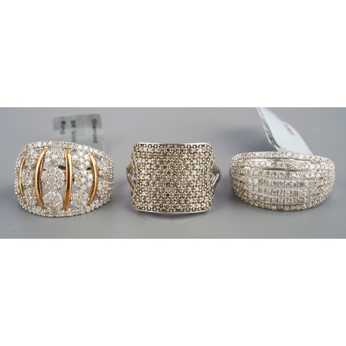 542 - Three modern hallmarked 9ct gold and diamond cluster/pave set rings, two white gold and one yellow g... 