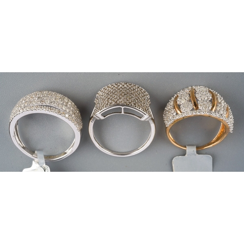 542 - Three modern hallmarked 9ct gold and diamond cluster/pave set rings, two white gold and one yellow g... 