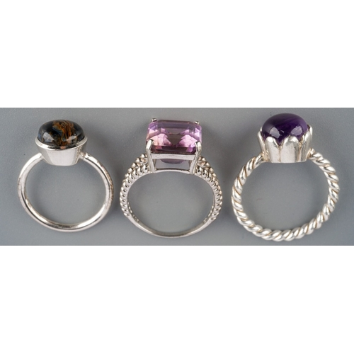 557 - Three silver Gemporia gem set rings, weight 14.37 grams.