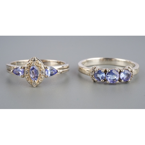 559 - Two tanzanite and white gem silver Gemporia rings, weight 4.90 grams.