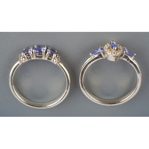 559 - Two tanzanite and white gem silver Gemporia rings, weight 4.90 grams.