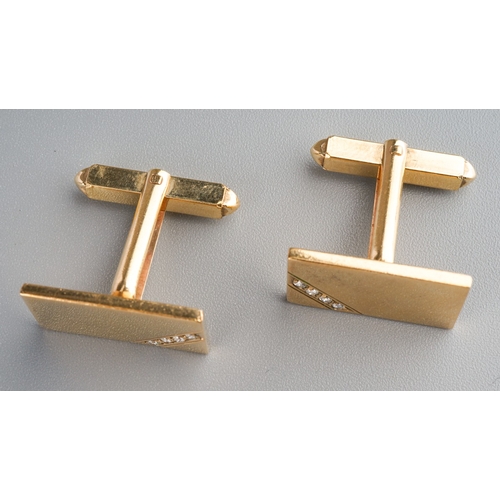 567 - A pair 9ct gold cufflinks set with diamonds, weight 9.77grams.