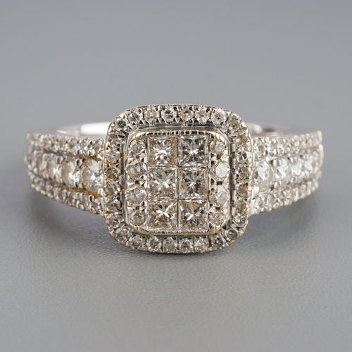 583 - 18ct diamond dress ring, stamped 1.00ct, weight 5.39 grams.