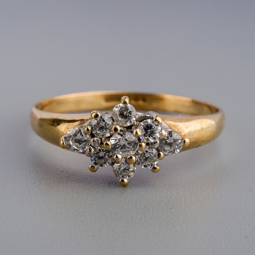 594 - 9ct gold  and diamond ring, gross weight 1.3g