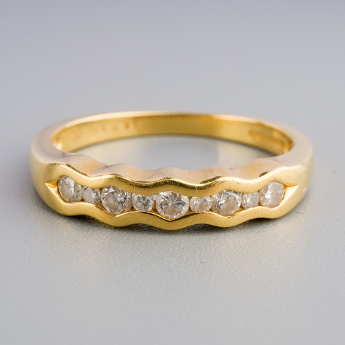 596 - 18ct gold Diamond wave ring, gross weight 3.1g