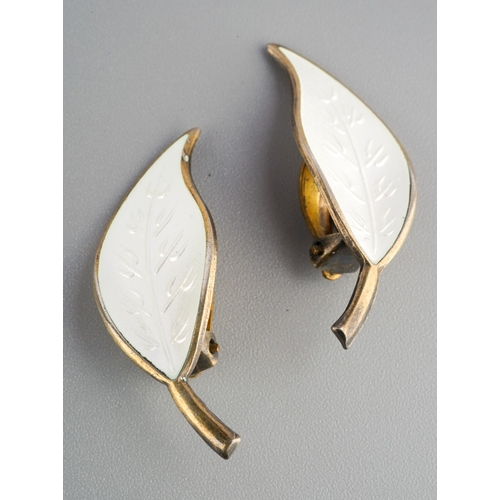 750 - A pair of silver and white enamel leaf form clip on earrings by David Andersen, marked to back