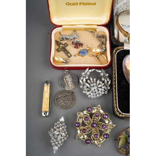 752 - Collection of coins, costume jewellery and silver items to include silver sugar tongs (29g), silver ... 