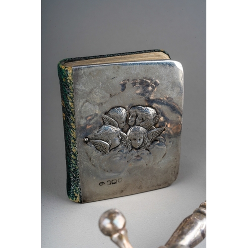 1135 - An Edwardian silver mounted prayer book, the cover chased with Reynold's Angels, hallmarked by Willi... 