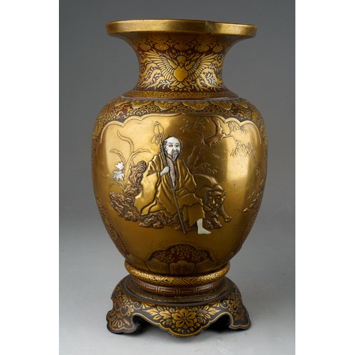 331 - A Japanese Shibayama gilt and brown lacquered papier mache vase, inlaid with  mother of pearl and iv... 