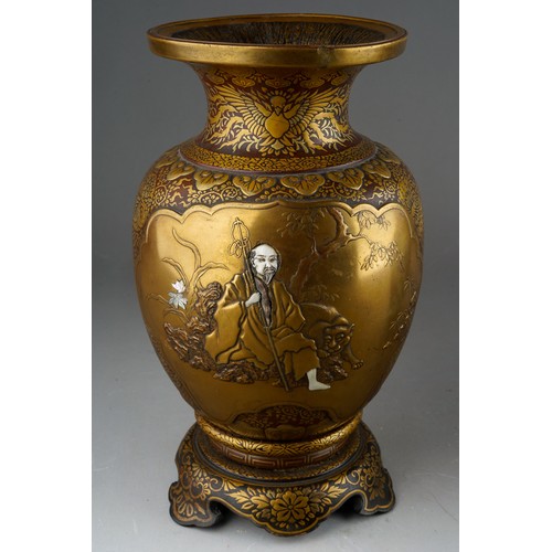 331 - A Japanese Shibayama gilt and brown lacquered papier mache vase, inlaid with  mother of pearl and iv... 