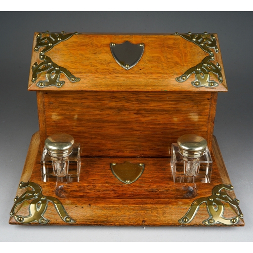 692 - A Victorian style oak brass mounted stationary box, the cover opens to reveal fitted interior, with ... 