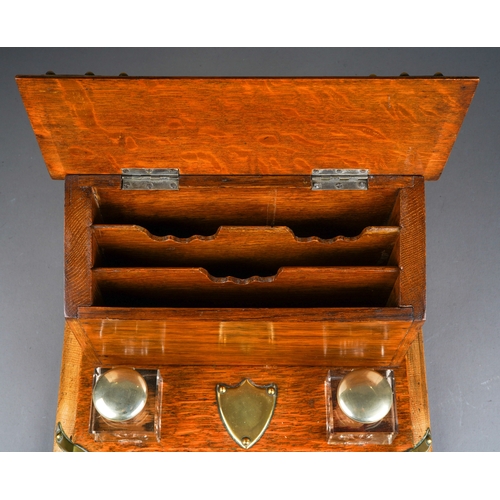 692 - A Victorian style oak brass mounted stationary box, the cover opens to reveal fitted interior, with ... 