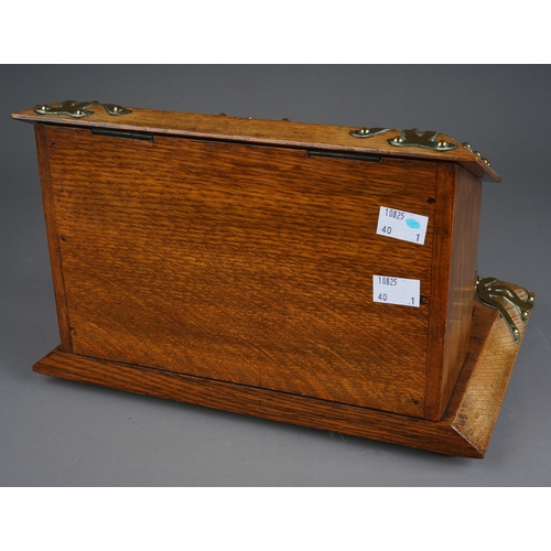 692 - A Victorian style oak brass mounted stationary box, the cover opens to reveal fitted interior, with ... 
