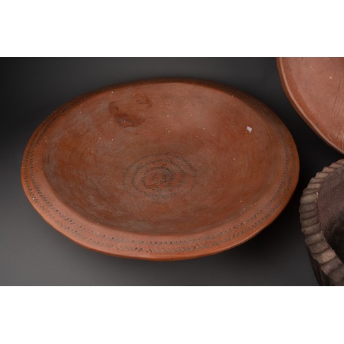 3 - A collection of eight pieces of second half 20th century terracotta Studio style pottery, all bearin... 