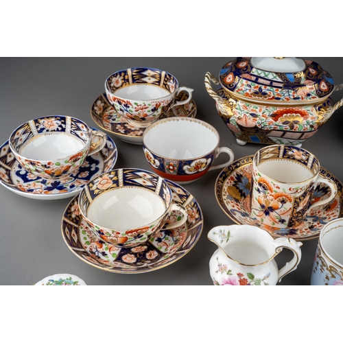 15 - A group of 19th Century DerbyImari to include: a two handled sugar basin and cover, four Imari sauce... 