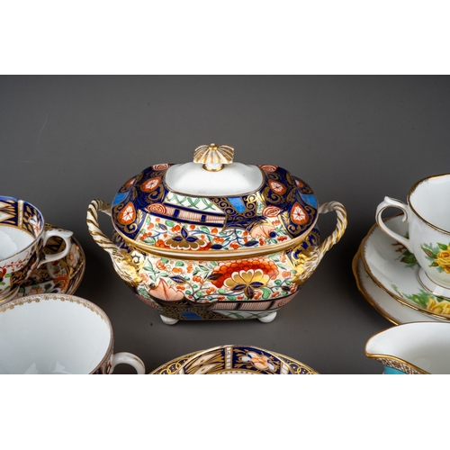 15 - A group of 19th Century DerbyImari to include: a two handled sugar basin and cover, four Imari sauce... 