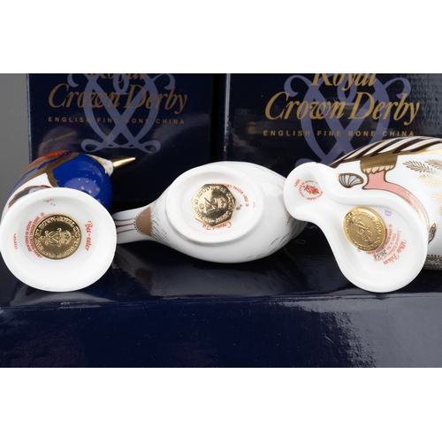 16 - Three Royal Crown Derby Paperweights to include: 
1. White Pelican, gold stopper, limited edition 20... 