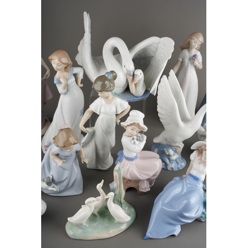 23 - Two boxes of sixteen Nao figures of birds and girls and ladies, including Swan and cygnet no. 1358, ... 