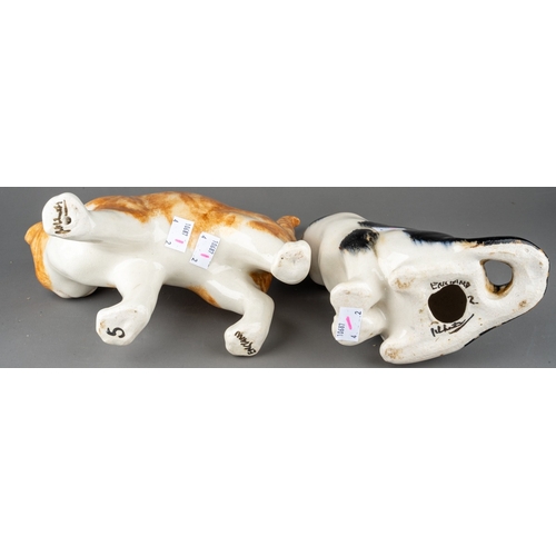 26 - Two Winstanley pottery cats, comprising a ginger and white standing cat, length 26cm x height 23.5cm... 