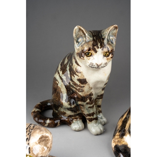 27 - Three Winstanley pottery cats and kittens, all with tabby effect glazes, comprising one crouching, l... 