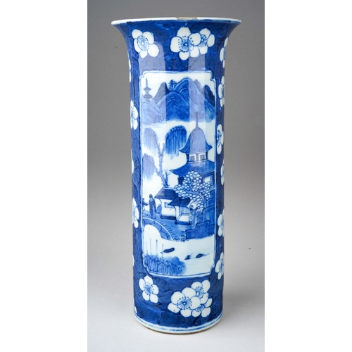 28 - A Chinese blue and white vase with flared rim, the body decorated with two panels depicting figures,... 