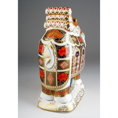 32 - A Royal Crown Derby paperweight in the form of a large Imari 1128 Howdah Elephant, with gold stopper... 