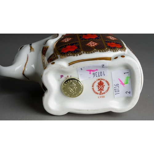 33 - A Royal Crown Derby paperweight in the form of an Imari 1128  small elephant, gold stopper, first qu... 