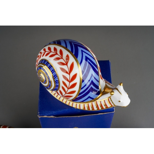 37 - Four Royal Crown Derby Imari paperweights, comprising a boxed snail, a frog and two tortoise, all fi... 