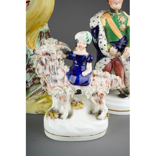 54 - Four Staffordshire models to include: 
1. HRH Prince Albert in green tunic, Garter medals, ermine ro... 