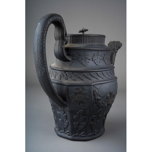 56 - A Regency black basalt large teapot, impressed vine leaf banding above Prince of Wales feather and G... 