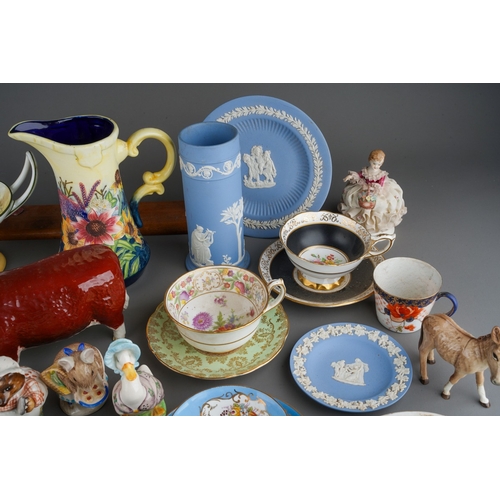 57 - Assorted  ceramics to include: a Staffordshire recumbant Ram, 8cm long, a Royal Doulton Falstaff taz... 