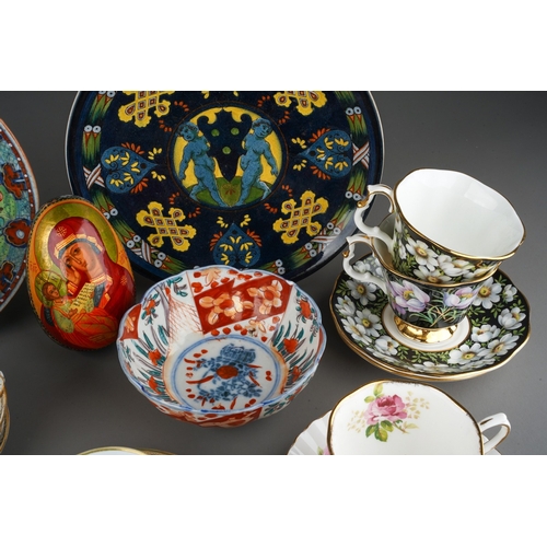 63 - A collection of ceramics to include: a part Dresden tea set (4 cups and saucers); a pair of Royal Al... 