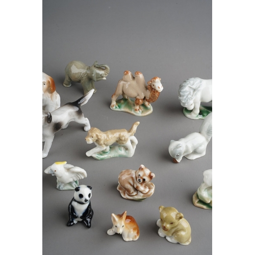 66 - Assorted collection of loose Wade Whimsies to include camels, fox, dogs, cats, pony etc., (1 bag)