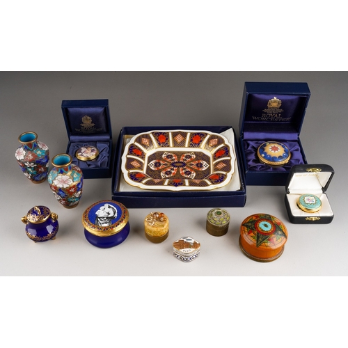 67 - A collection of boxed ceramic boxes and covers to include: Royal Worcester Millenium and small Candy... 