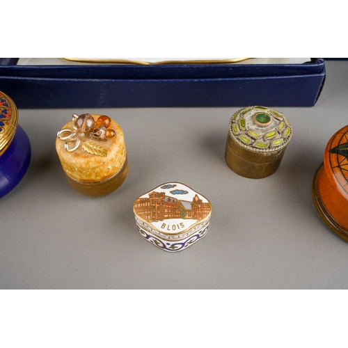 67 - A collection of boxed ceramic boxes and covers to include: Royal Worcester Millenium and small Candy... 