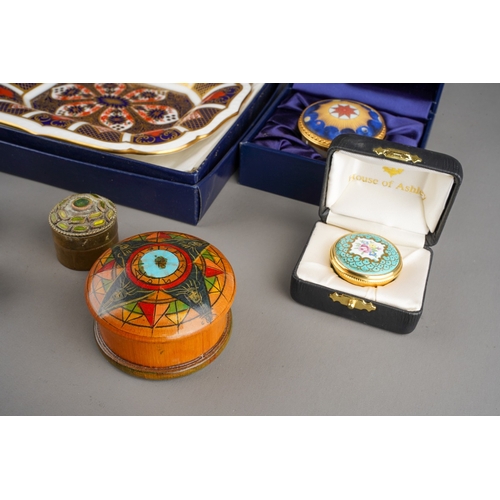 67 - A collection of boxed ceramic boxes and covers to include: Royal Worcester Millenium and small Candy... 