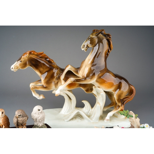 68 - A Royal Dux ceramic large model of two Chesnut horses in flight modelled by K Leach, factory badge t... 