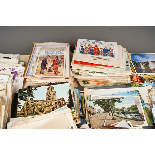 A collection of vintage postcards and birthday cards