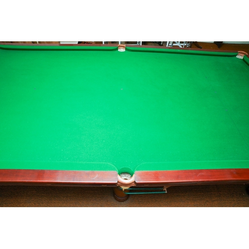 379 - An early 20th century walnut framed Orme & Sons billiard table, maker's ivorine trade label, five se... 