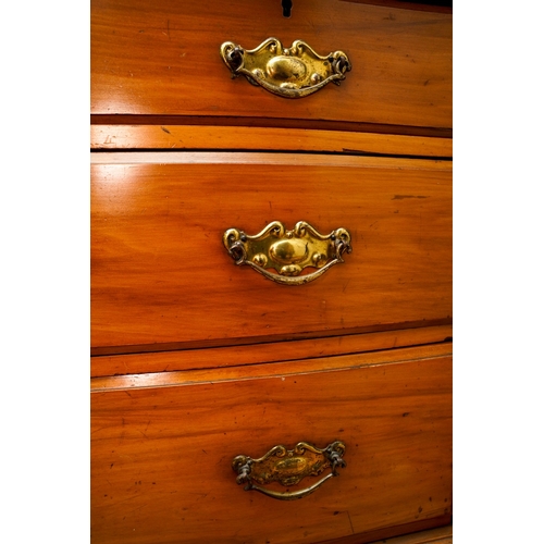 387 - An Edwardian walnut dressing table, the back with central swing mirror flanked by fret carved and mi... 