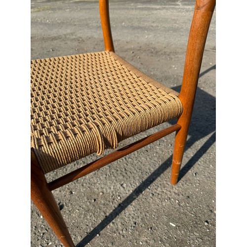 391 - A set of six mid-20thC Niels Moller for J L Moller bar back teak dining Chairs, all with rush seats,... 